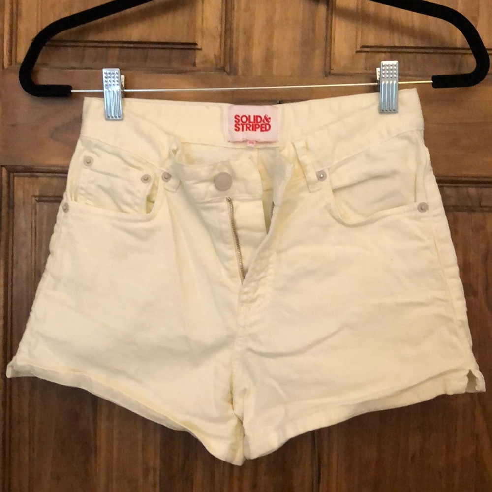 Solid & Striped white high waisted jean shorts.
